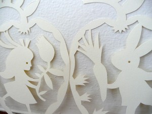 Paper rabbit and Alice cut from templates